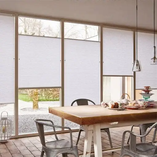 Dining room with large windows and blinds